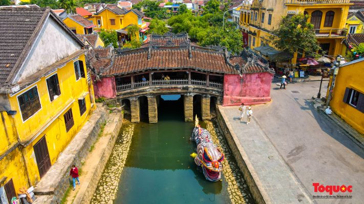 The lantern-lit streets of Hoi An Ancient Town, a UNESCO World Heritage Site known for its well-preserved architecture and rich cultural heritage
