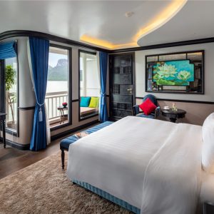 Deluxe cabin aboard Verdure Lotus cruise with stunning Ha Long Bay views.