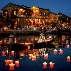 The lantern-lit streets of Hoi An Ancient Town, a UNESCO World Heritage Site known for its well-preserved architecture and rich cultural heritage
