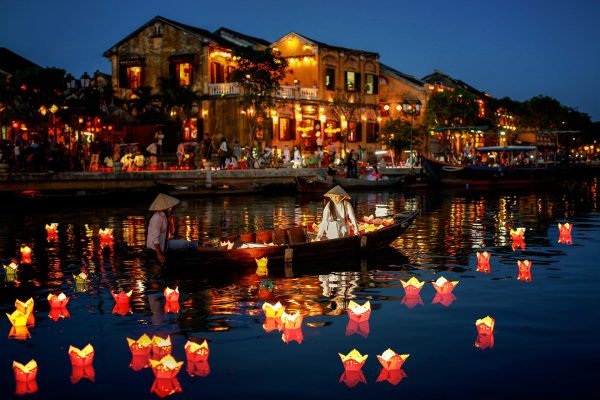 The lantern-lit streets of Hoi An Ancient Town, a UNESCO World Heritage Site known for its well-preserved architecture and rich cultural heritage