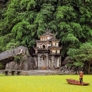 Bich Dong Pagoda, an ancient pagoda nestled within lush limestone mountains in Ninh Binh, Vietnam